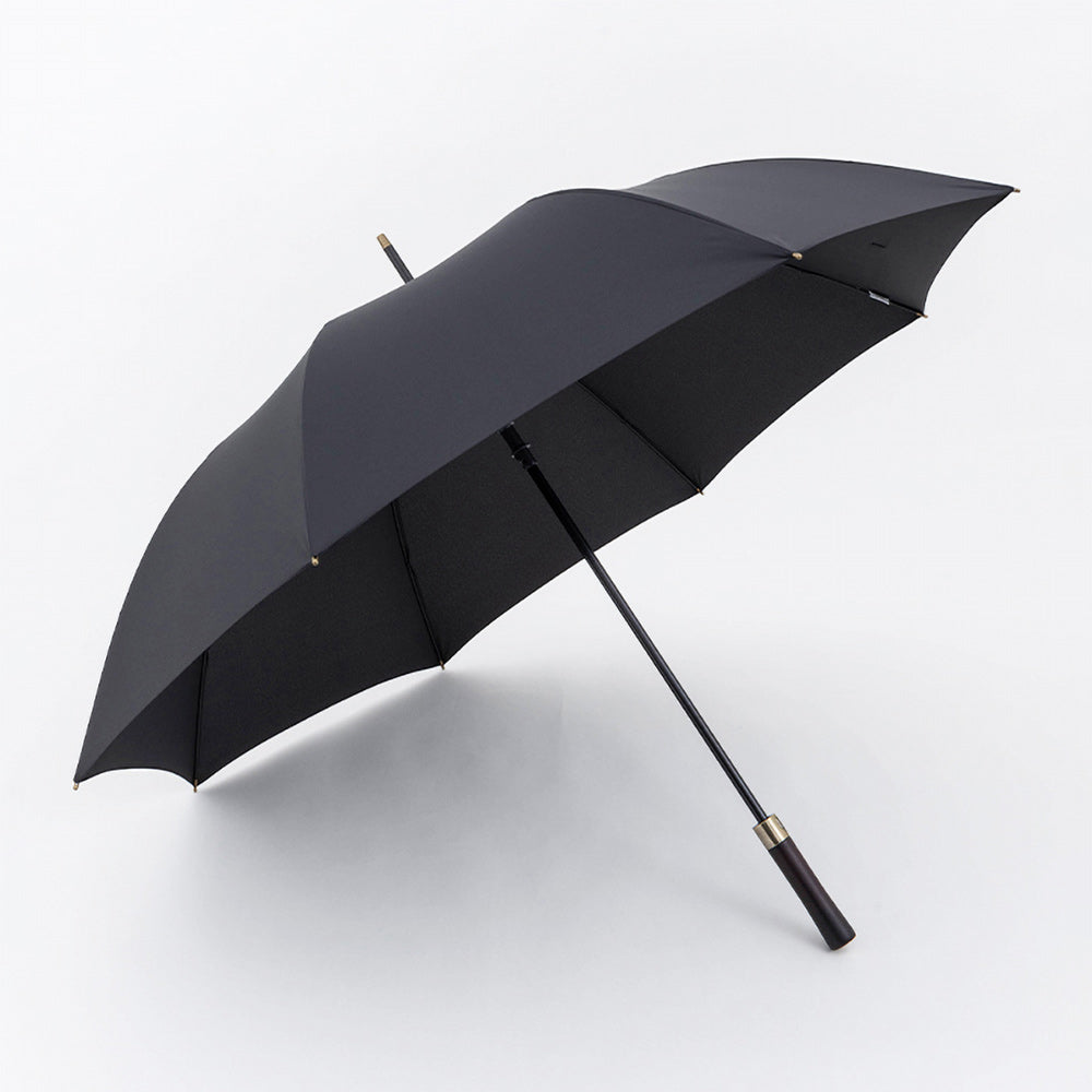 Sorélane Étendue : parapluie noir ouvert.