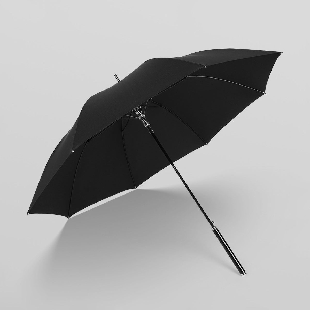 Sorélane Trait : parapluie noir ouvert.